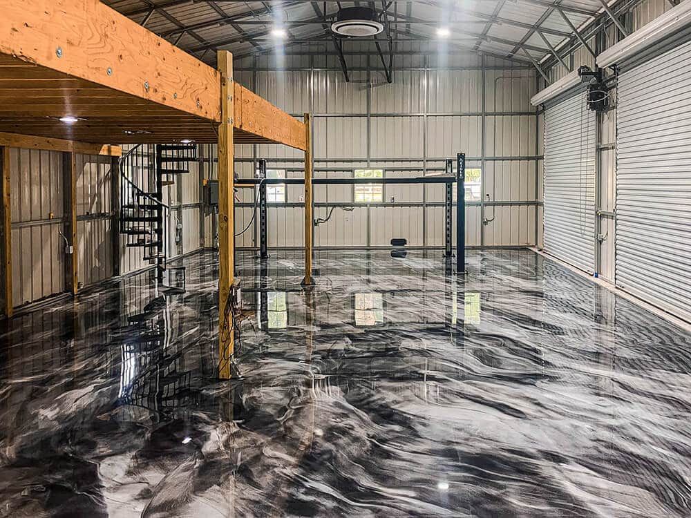 Black metallic epoxy floor in a workshop